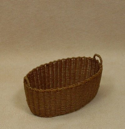 A Woven Laundry Basket - Click Image to Close